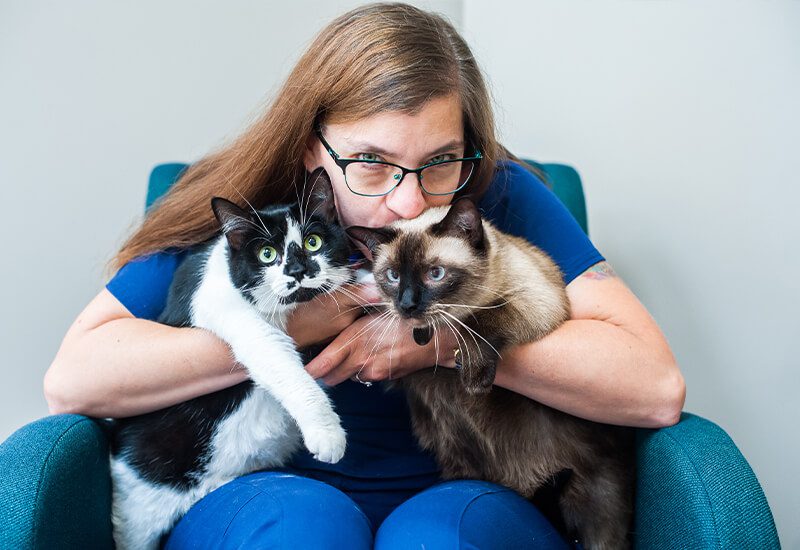 Female Vet With Two Cats